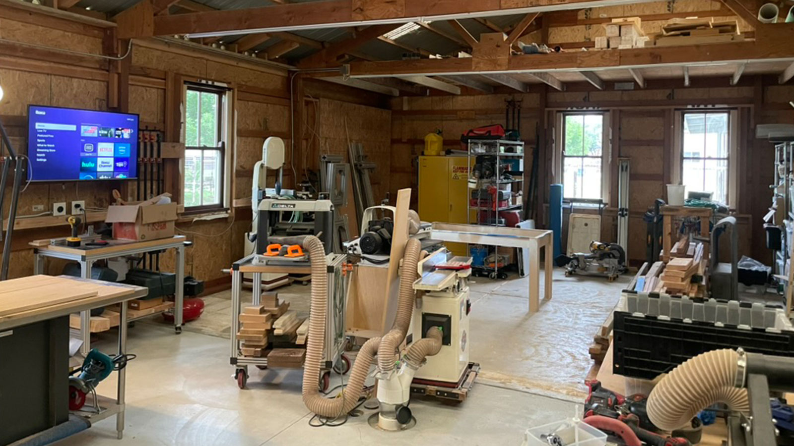 Inside the woodshop — tools and bench