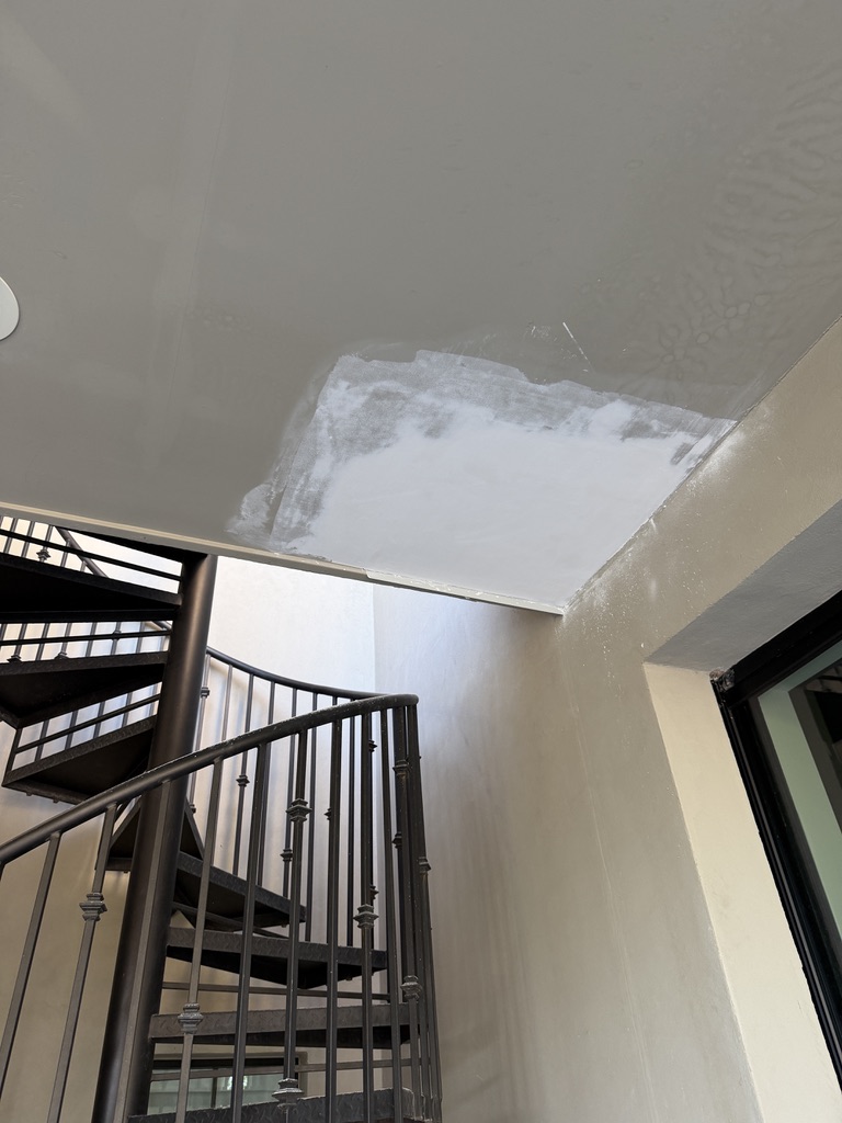 Ceiling drywall repair after an upstairs leak in Gilbert, AZ
